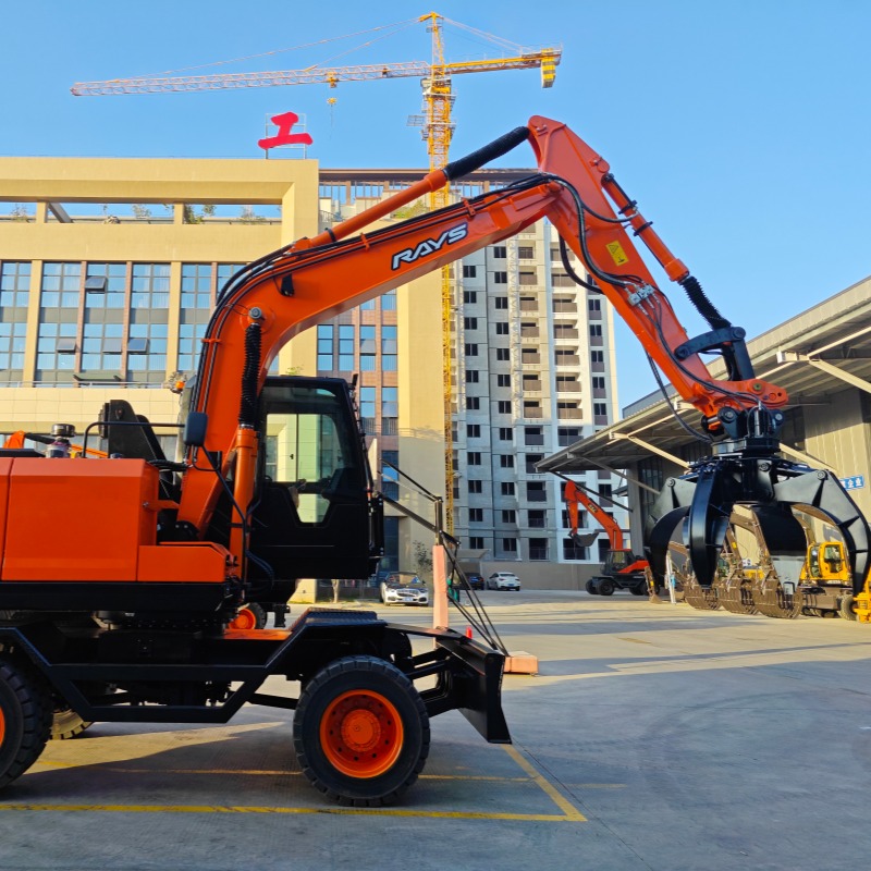 Jinggong Excavator Highlights JG150S Four-Claw Wheel Excavator for Material Handling Efficiency